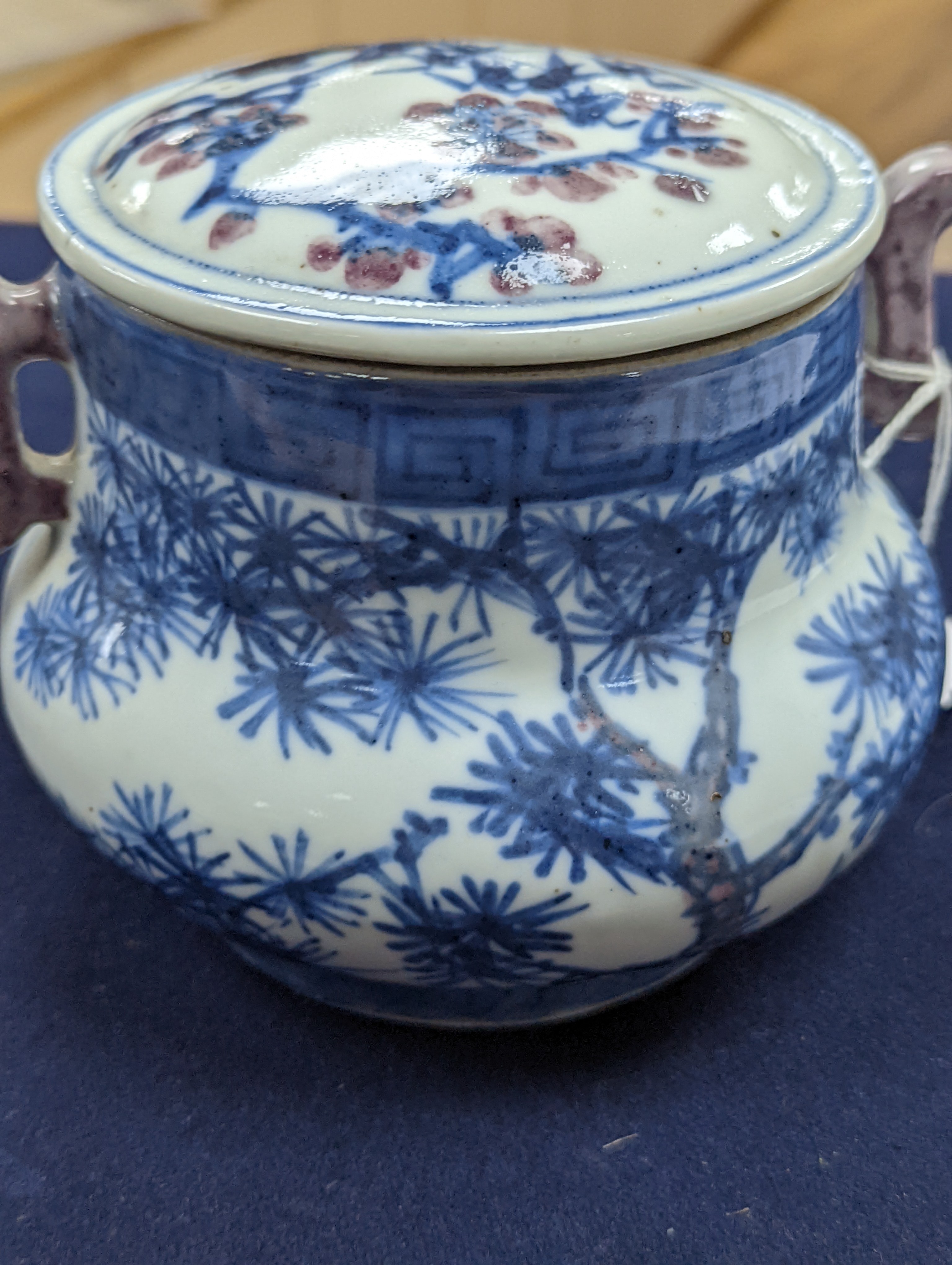 A Chinese underglaze blue and copper red jar and cover, Xuande six character mark but later 12cm